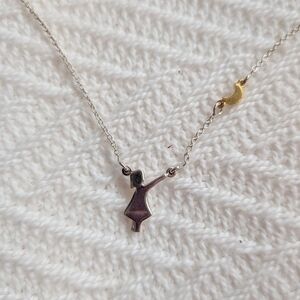 Silver Figure Pendant Necklace with Gold Accent